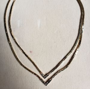 Stunning gold two chain point crystal necklace.